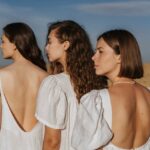 Three women looking to the left
