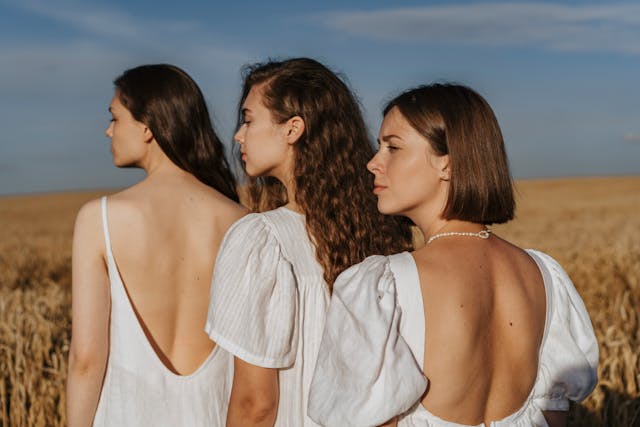 Three women looking to the left