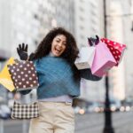 woman holding shopping bags