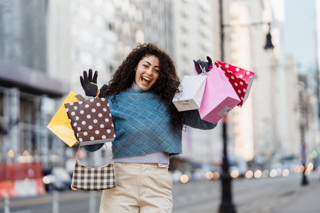 woman holding shopping bags